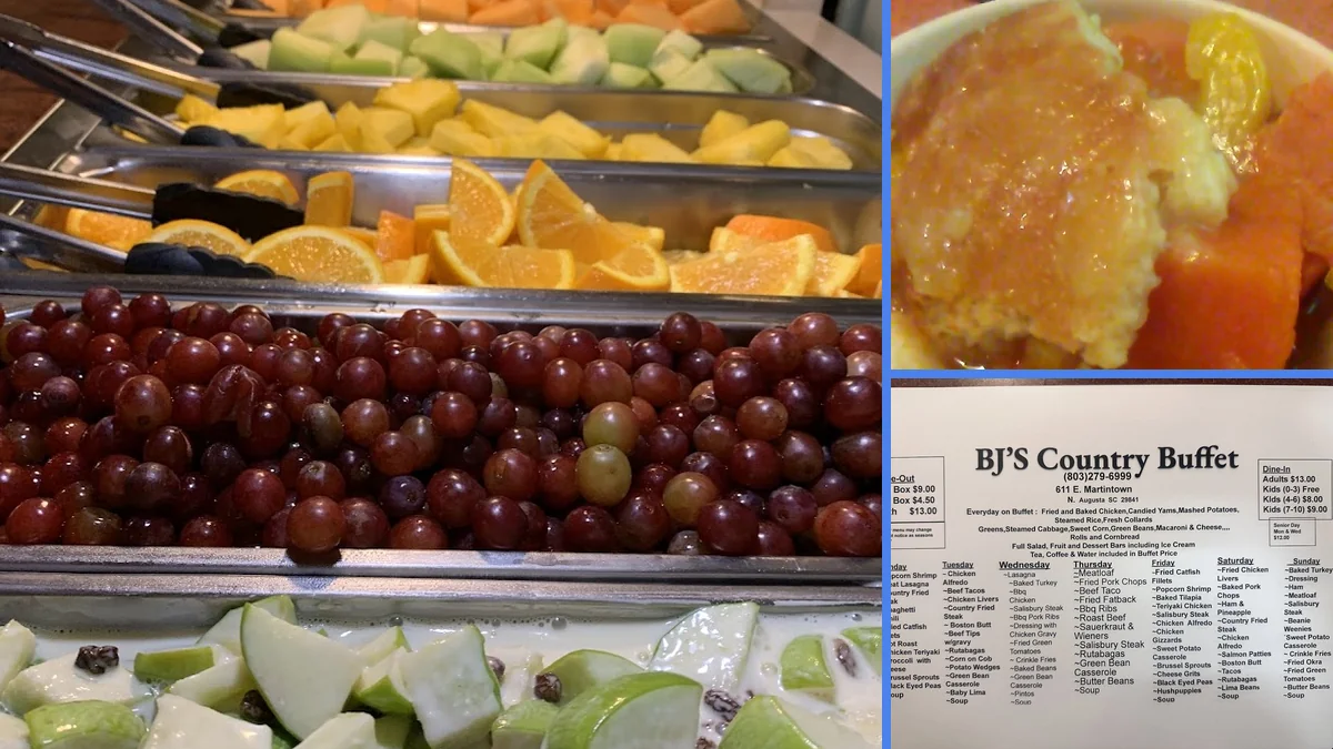 Salad bar with fresh greens and serving spoons.